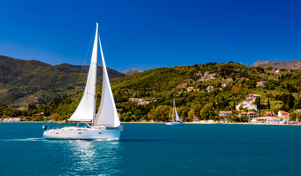 Sailing boat on turquoise Mediterranean waters